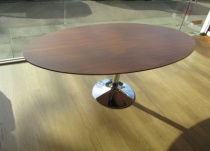 Oval dining table in walnut