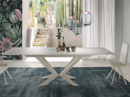 Motion glass dining table
